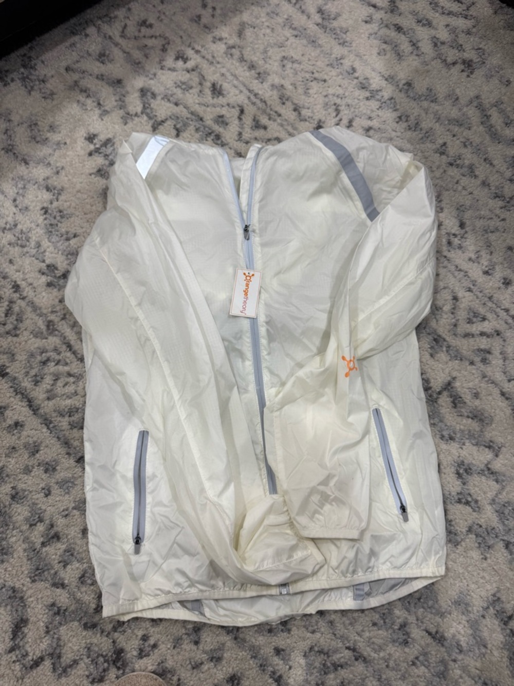 Orange Theory Lightweight Cream Windbreaker Jacket with Reflective Trim